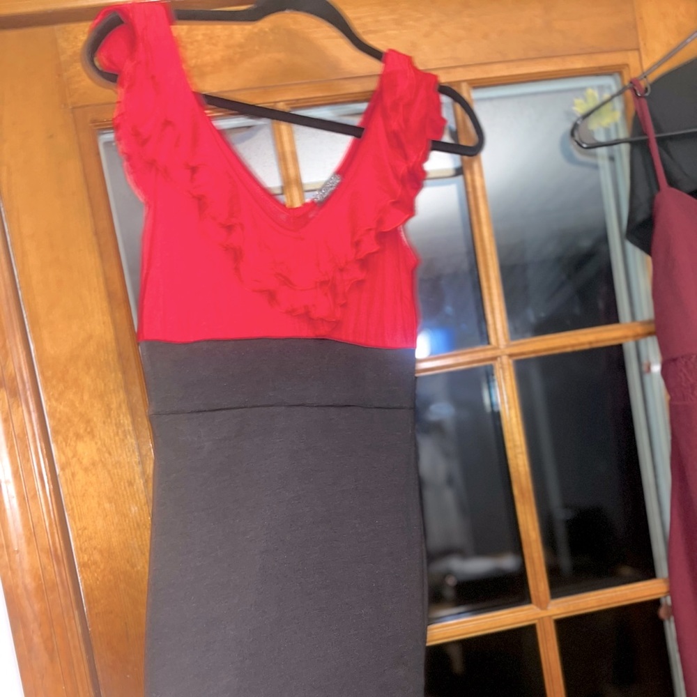 Beautiful red ruffled black form fitting dress ( medium )